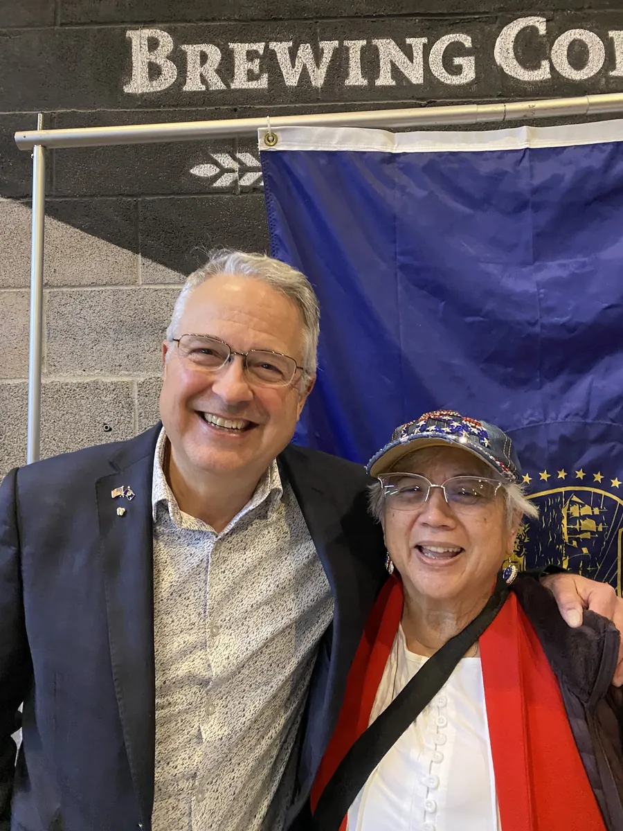 Representative Ed Diehl and Anna Munson smiling together at a Salem event